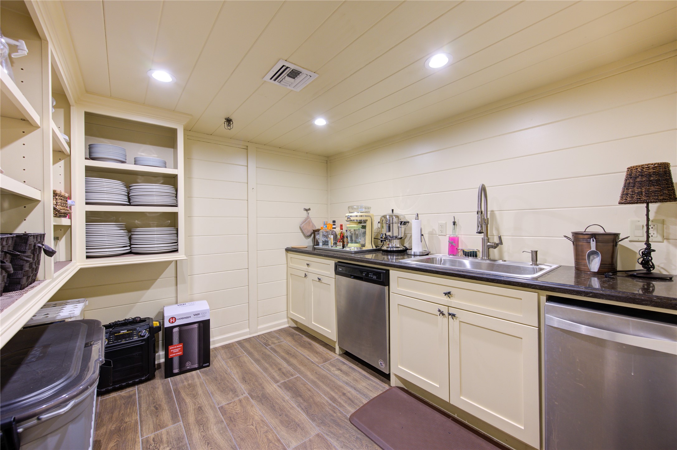 150 Gessner Road, Unit 5A Houston, TX 77024 - Photo 36 of 36 a kitchen with cabinets and wooden floor