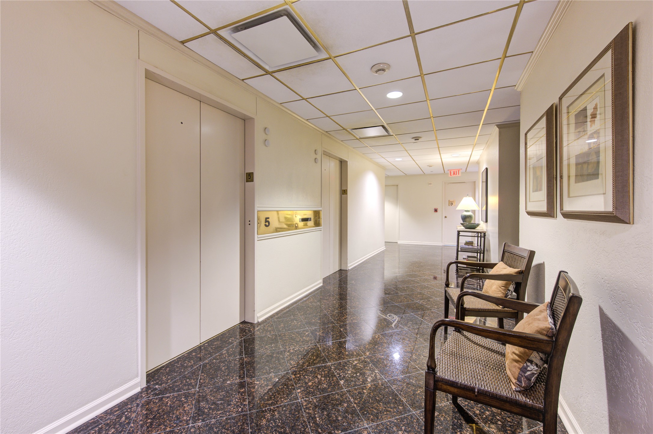 150 Gessner Road, Unit 5A Houston, TX 77024 - Photo 5 of 36 a view of a hallway with seating area