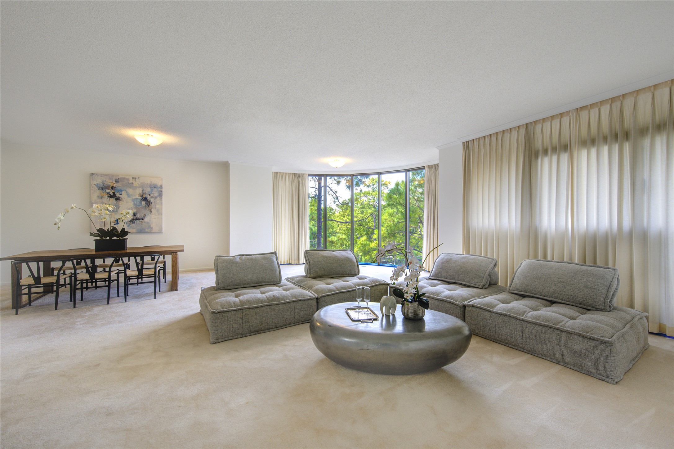 150 Gessner Road, Unit 5A Houston, TX 77024 - Photo 8 of 36 a living room with furniture and a large window