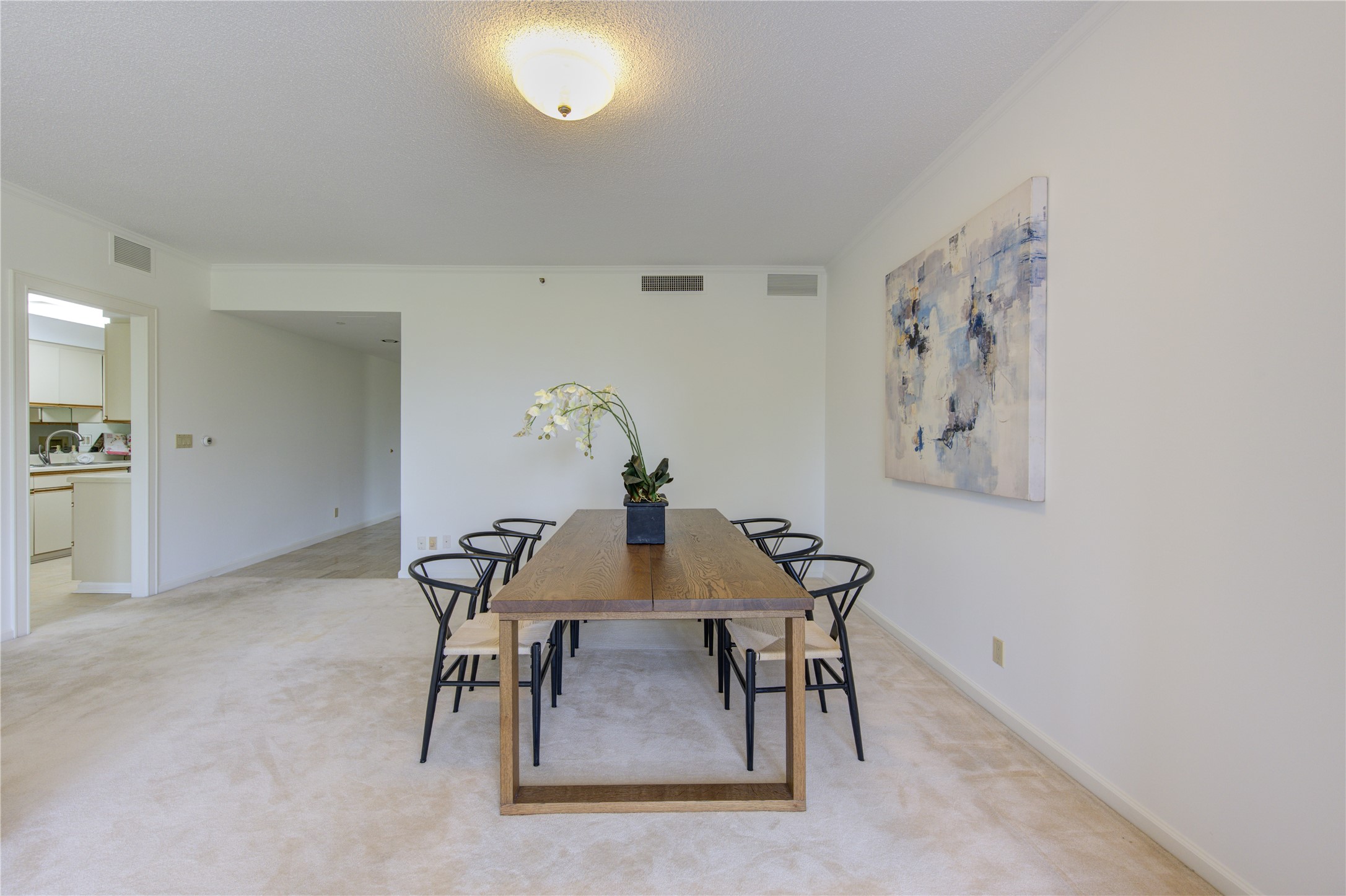 150 Gessner Road, Unit 5A Houston, TX 77024 - Photo 9 of 36 a view of a dining room with furniture