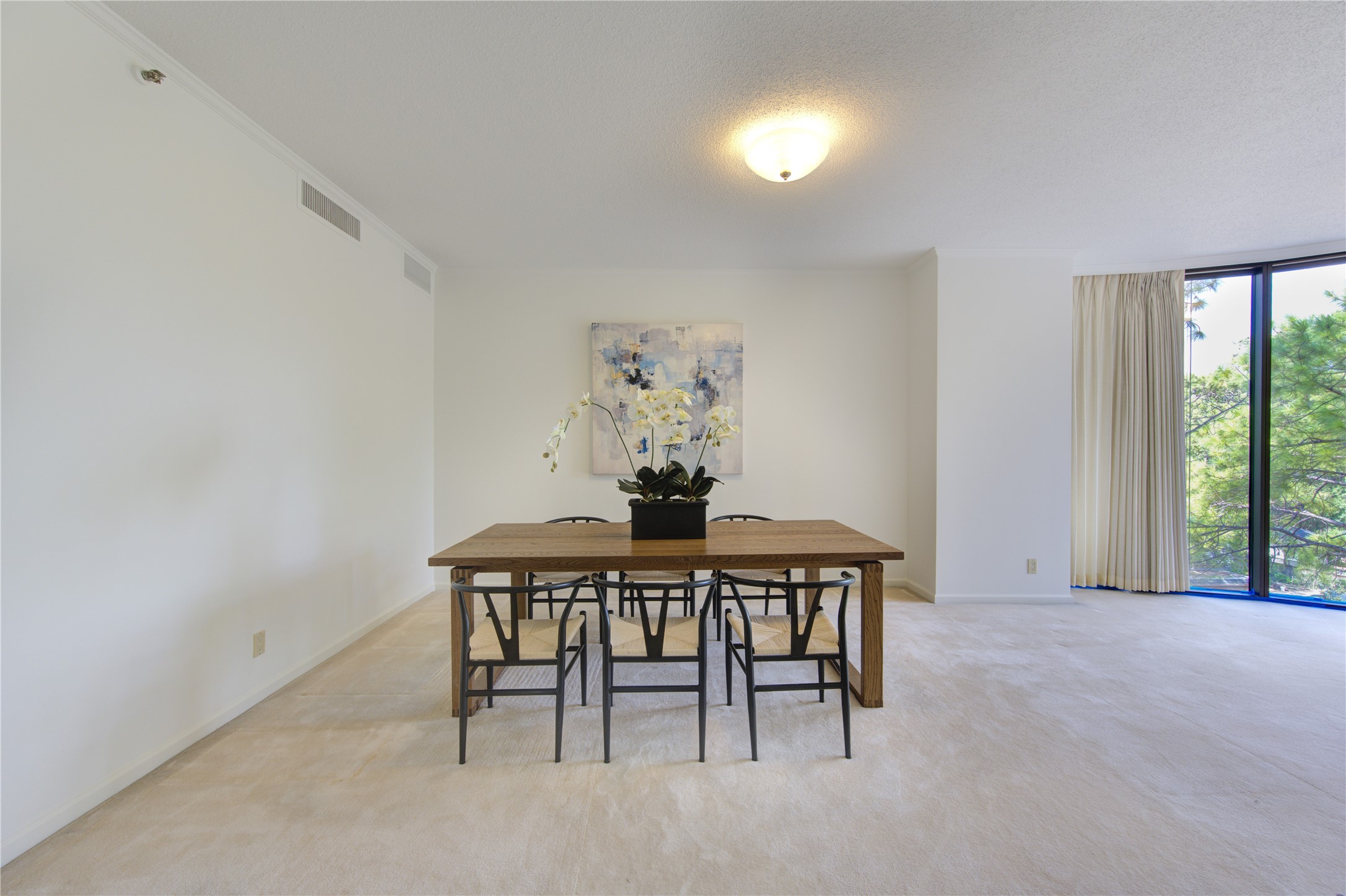 150 Gessner Road, Unit 5A Houston, TX 77024 - Photo 10 of 36 a dining room with furniture and window
