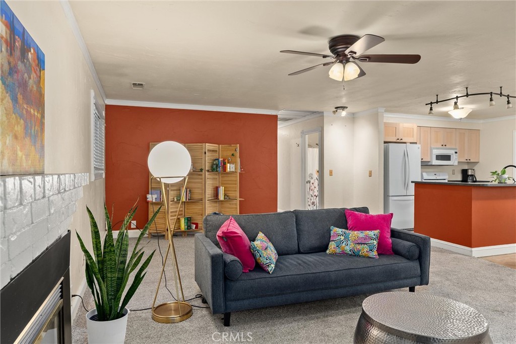 3030 Silverbell Road Chico, CA 95973 - Photo 16 of 42 a living room with furniture potted plant and a view of kitchen