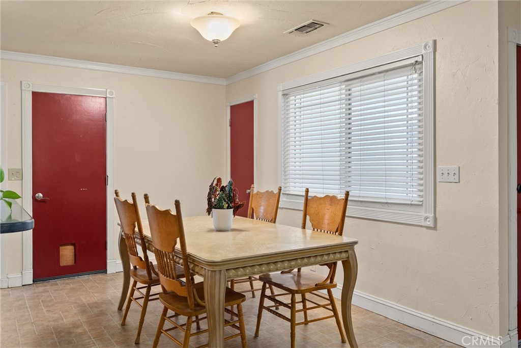 3030 Silverbell Road Chico, CA 95973 - Photo 20 of 42 a view of a dining room with furniture and wooden floor
