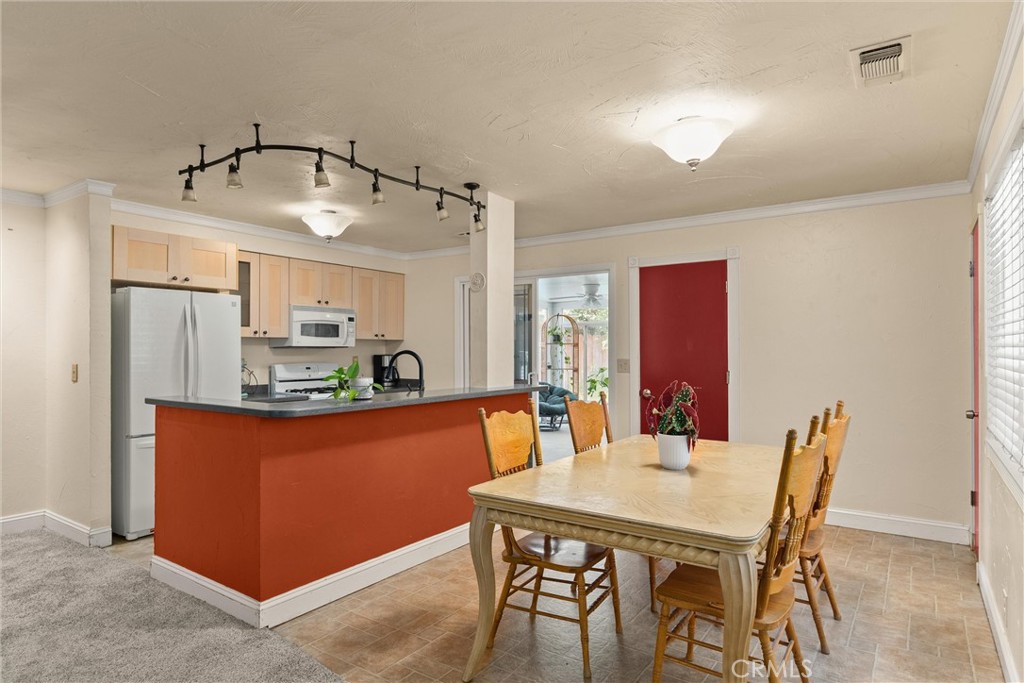 3030 Silverbell Road Chico, CA 95973 - Photo 3 of 42 a dining room with furniture and window