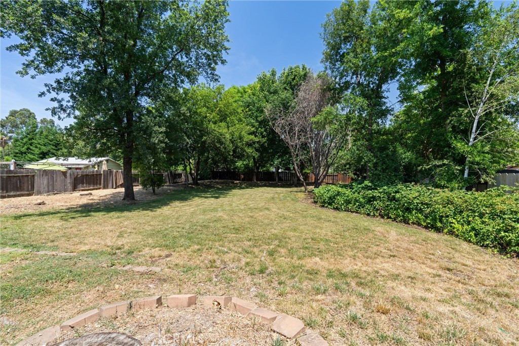 3030 Silverbell Road Chico, CA 95973 - Photo 33 of 42 a view of a yard with a tree