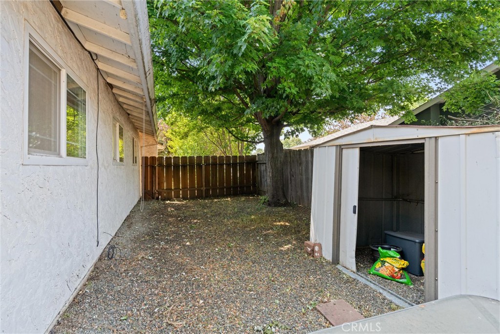 3030 Silverbell Road Chico, CA 95973 - Photo 39 of 42 a backyard of a house with lots of green space