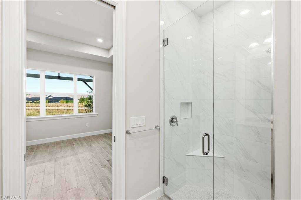 8937 Calypso Court Naples, FL 34113 - Photo 15 of 43 a view of an empty room and window