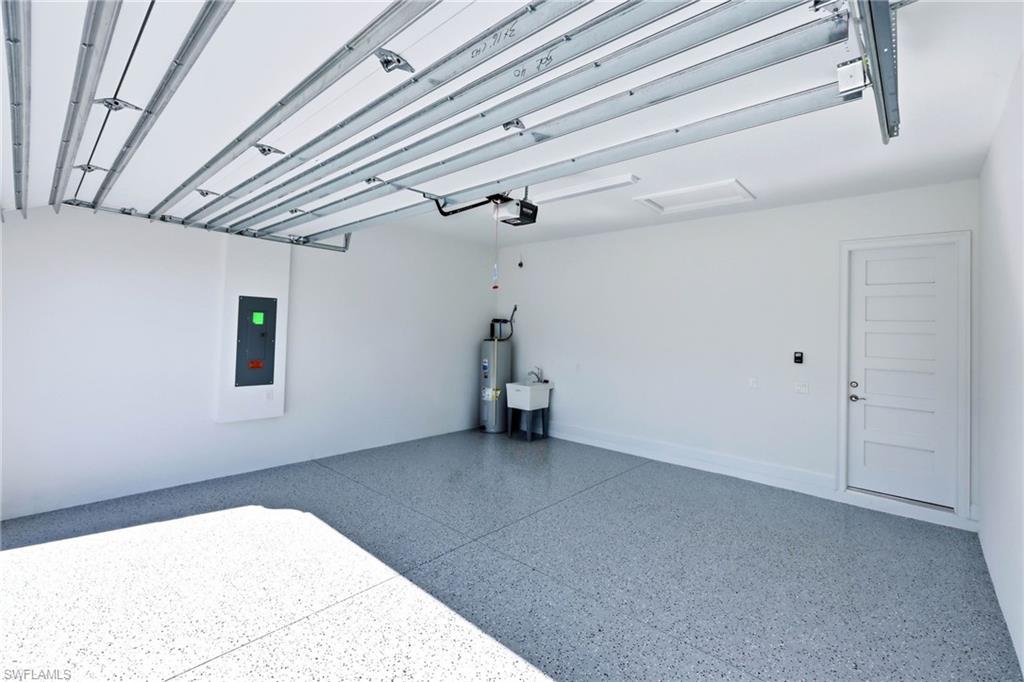 8937 Calypso Court Naples, FL 34113 - Photo 22 of 43 a view of empty room with wooden floor