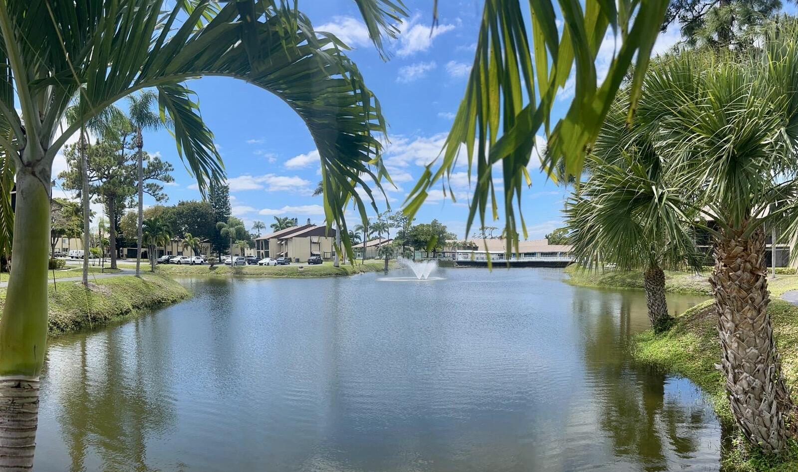 301 Pine Ridge Circle, Unit C2 Greenacres, FL 33463 - Photo 26 of 28 Lake in Pine Ridge