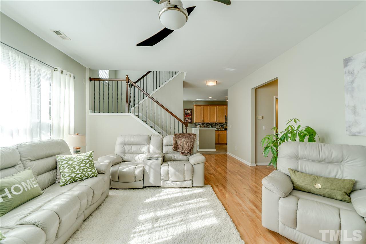 5319 Griffith Park Road Raleigh, NC 27613 - Photo 13 of 25 a living room with furniture or couch and a potted plant