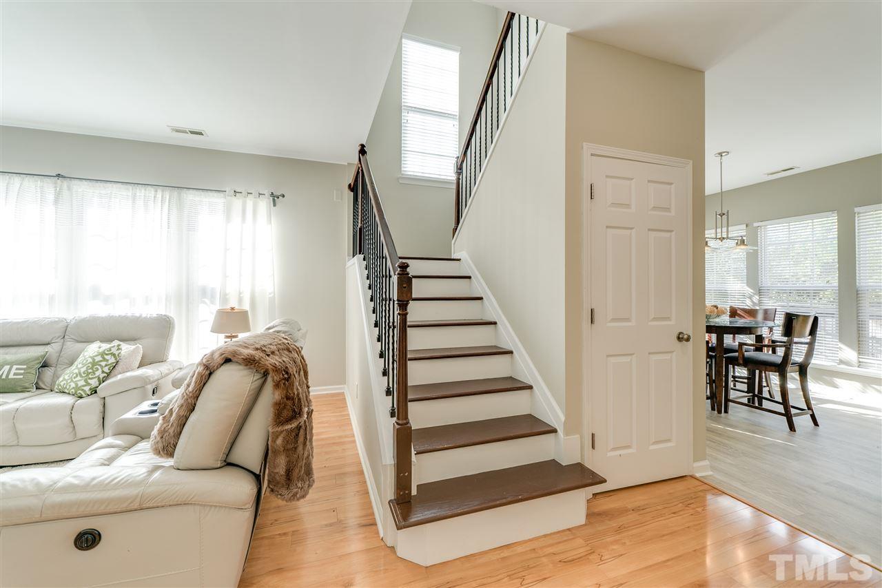 5319 Griffith Park Road Raleigh, NC 27613 - Photo 16 of 25 a living room with furniture and wooden floor
