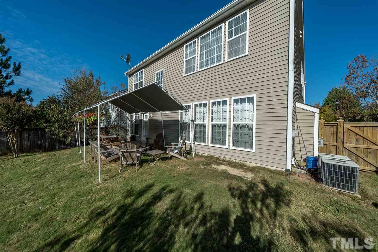 5319 Griffith Park Road Raleigh, NC 27613 - Photo 25 of 25 a view of a house with backyard sitting area and garden