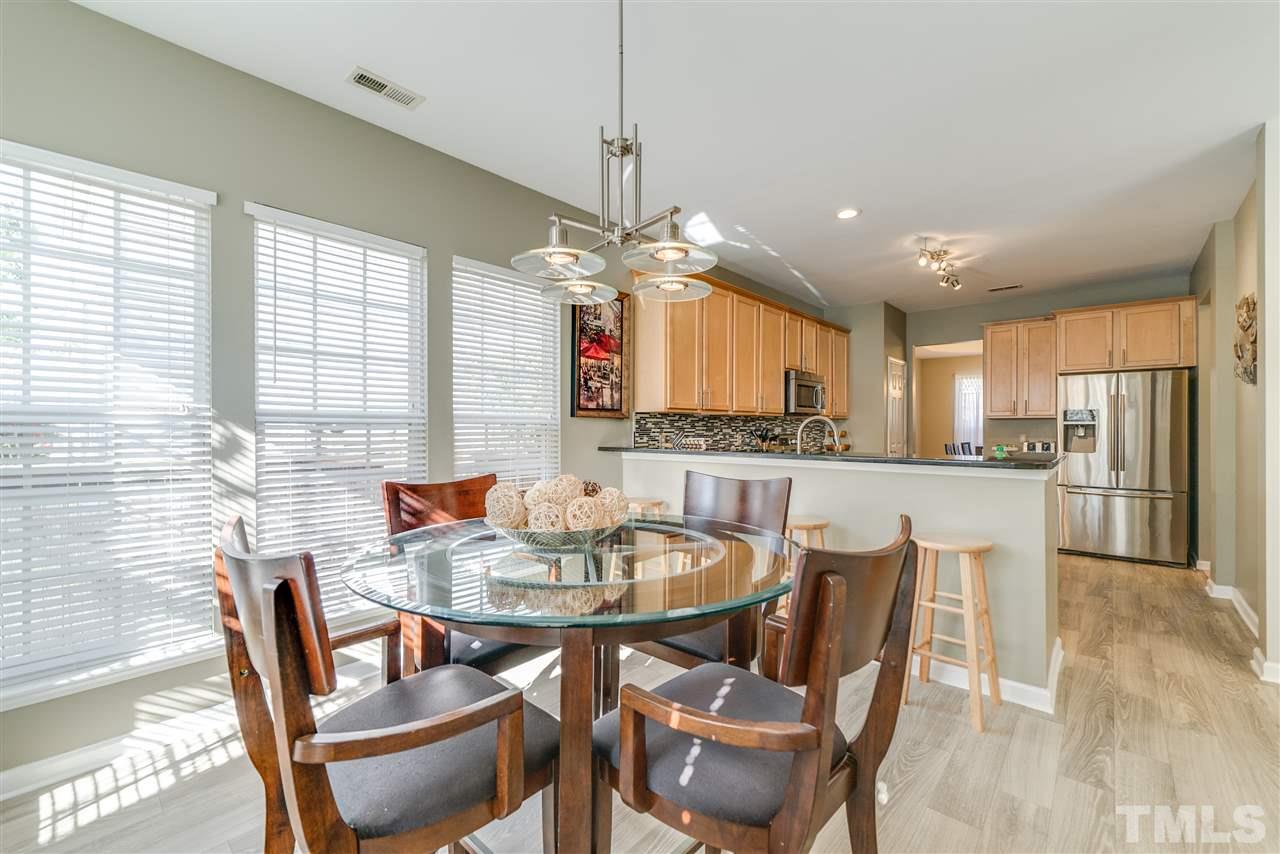 5319 Griffith Park Road Raleigh, NC 27613 - Photo 10 of 25 a view of a dining room and livingroom view