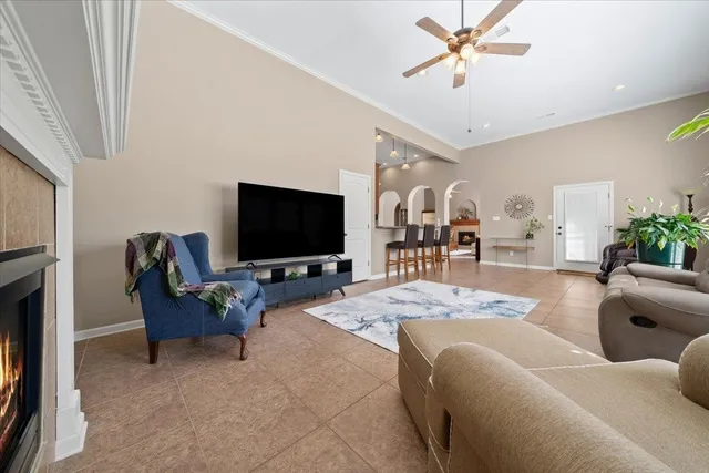 a kitchen with stainless steel appliances granite countertop a stove and cabinets