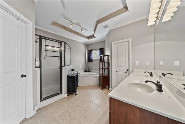 a view of living room with furniture and chandelier