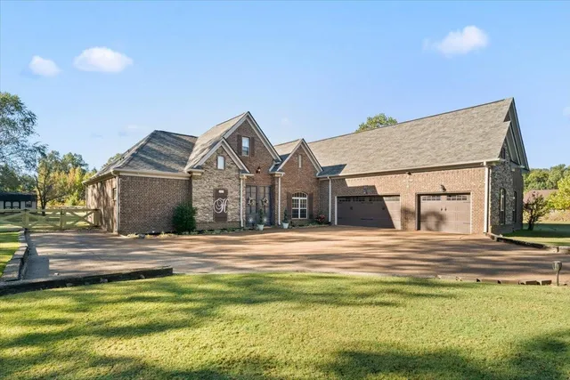 a front view of a house with a ocean view