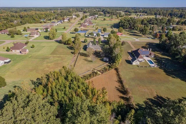 a view of a lake with a yard