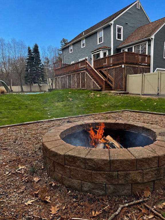78 Gretchen Way Raynham, MA 02767 - Photo 41 of 42 a view of a house with a yard