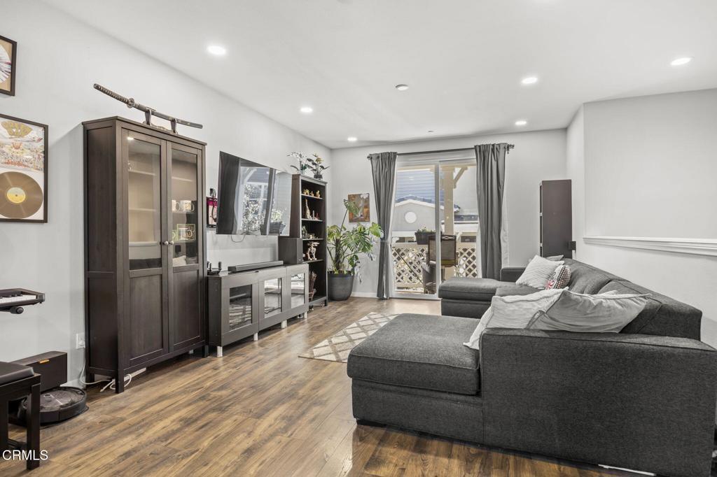 3644 Islander Walk Oxnard, CA 93035 - Photo 3 of 9 a living room with furniture and large window