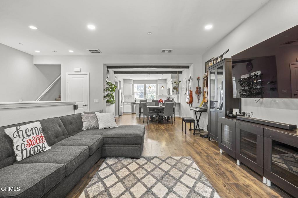 3644 Islander Walk Oxnard, CA 93035 - Photo 5 of 9 a living room with furniture and a flat screen tv