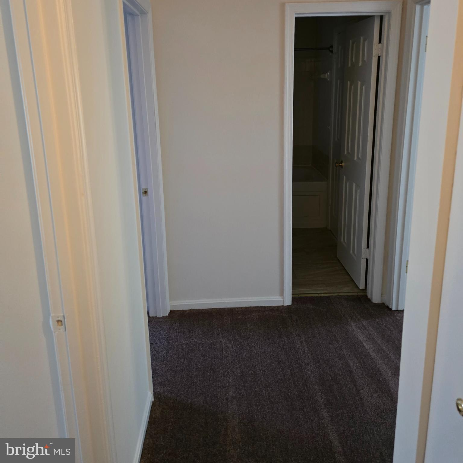 809 St Michaels Drive Bowie, MD 20721 - Photo 12 of 17 a view of a hallway with wooden floor