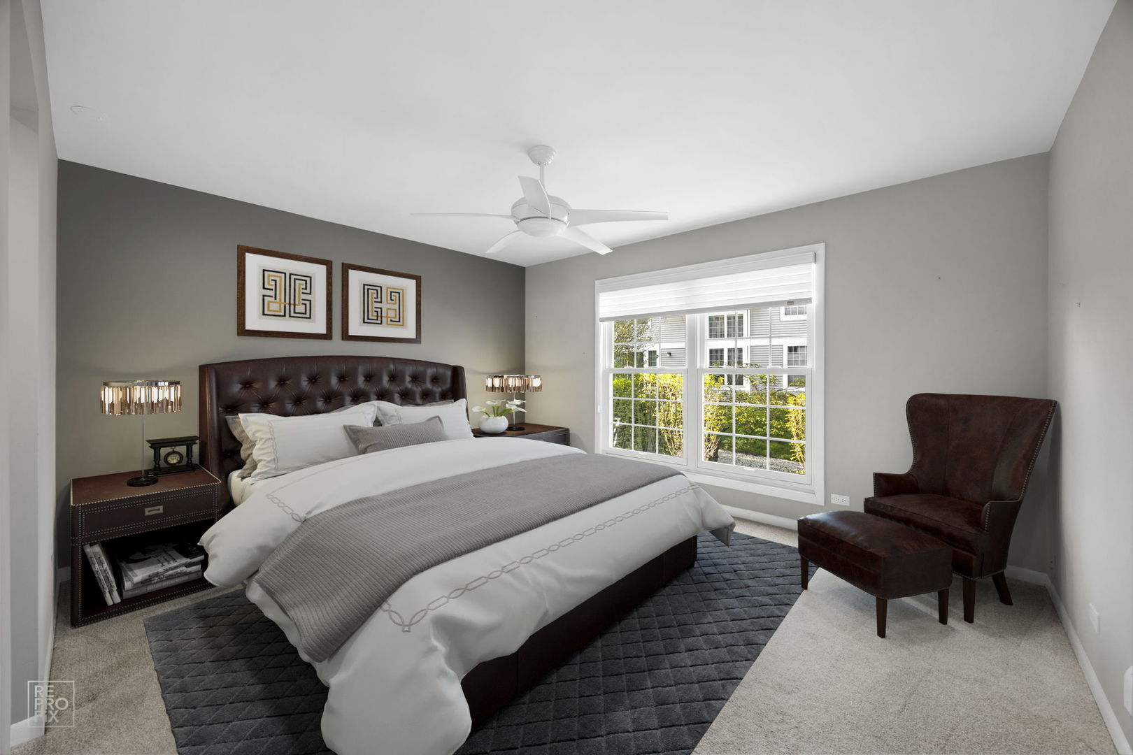 715 Brookvale Drive, Unit C Wheeling, IL 60090 - Photo 4 of 10 a bedroom with a bed and a couch