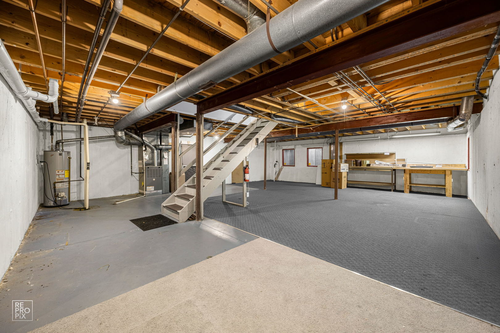715 Brookvale Drive, Unit C Wheeling, IL 60090 - Photo 9 of 10 a view of empty room with wooden ceiling