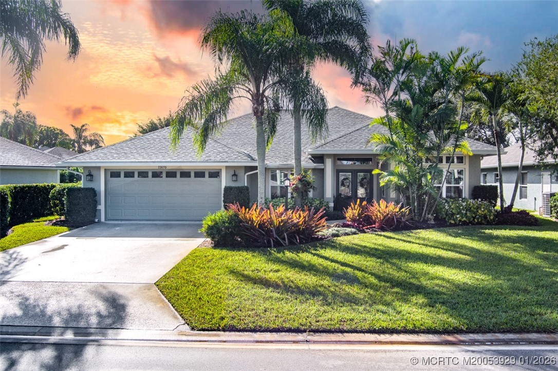 1976 Southwest Oak Ridge Road Palm City, FL 34990 - Photo 1 of 65 Front View-Beautifully Landscaped
