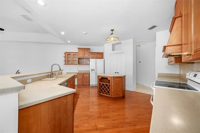 a bathroom with a sink a toilet and vanity