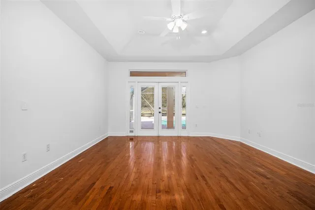 a view of a swimming pool with a patio