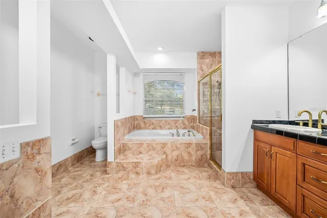 a view of empty room with wooden floor and city view