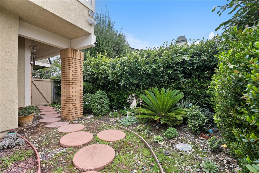 16 East Yale Loop, Unit 28 Irvine, CA 92604 - Photo 32 of 44 a view of a floor with a chair in a patio