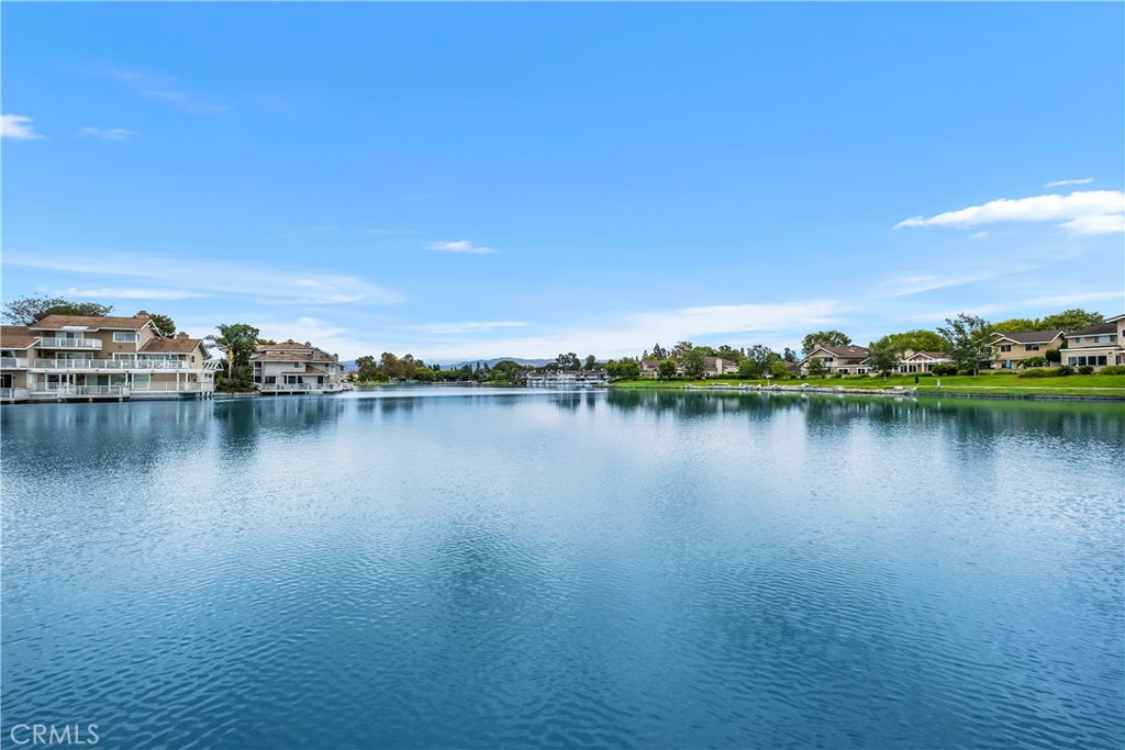 16 East Yale Loop, Unit 28 Irvine, CA 92604 - Photo 38 of 44 a view of a lake with houses