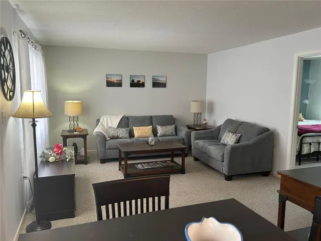 a view of a livingroom and furniture