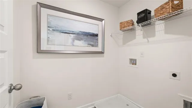 a view of a workspace with furniture