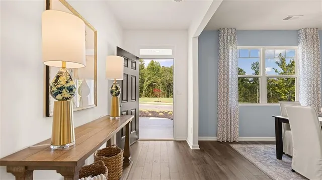 a view of a dining room with furniture window and outside view
