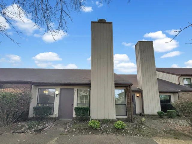 a front view of a building with shower