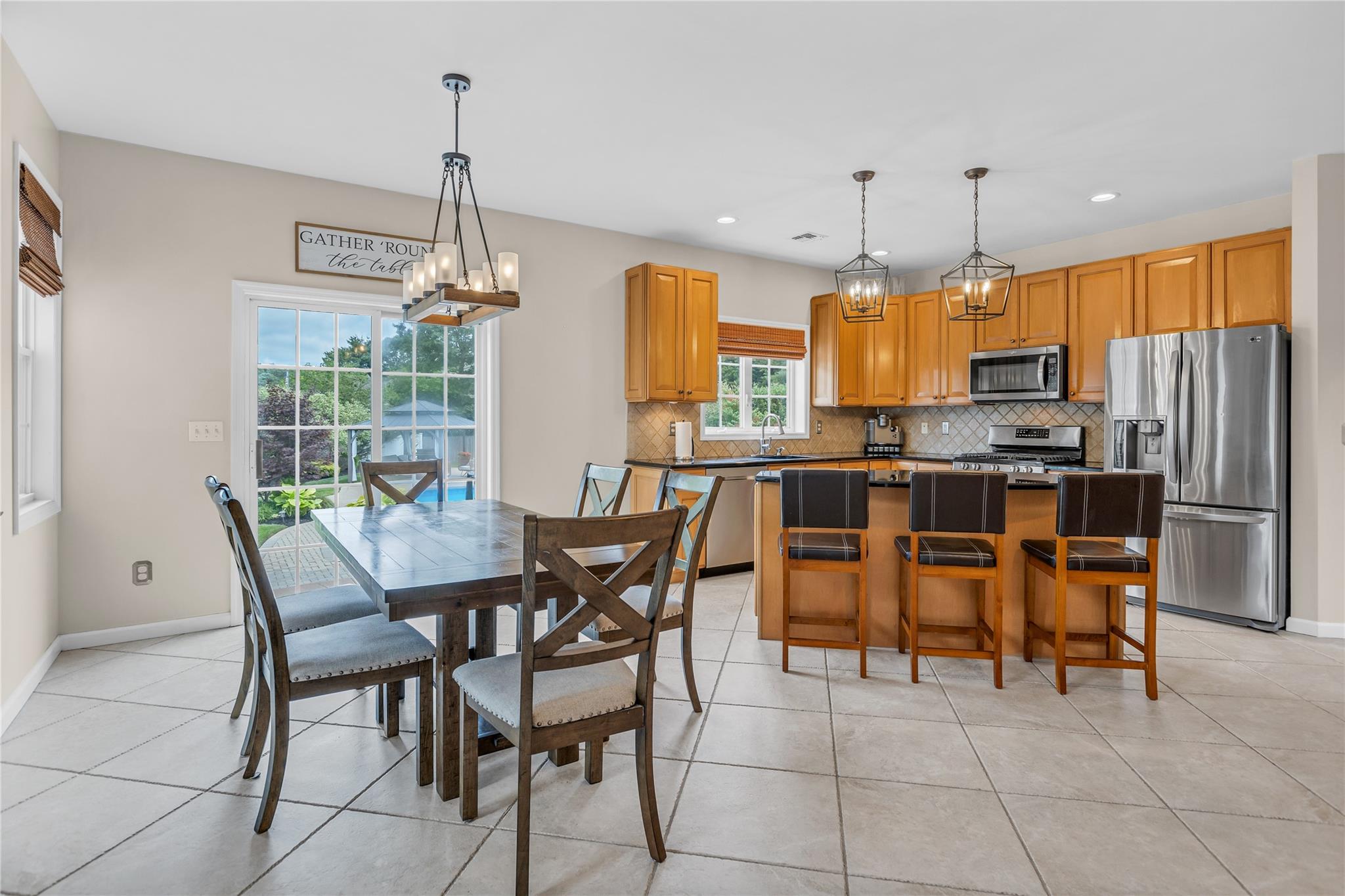265 Hidden Acres Path Wading River, NY 11792 - Photo 13 of 46 Dining area with a chandelier, light tile patterned floors, and recessed lighting
