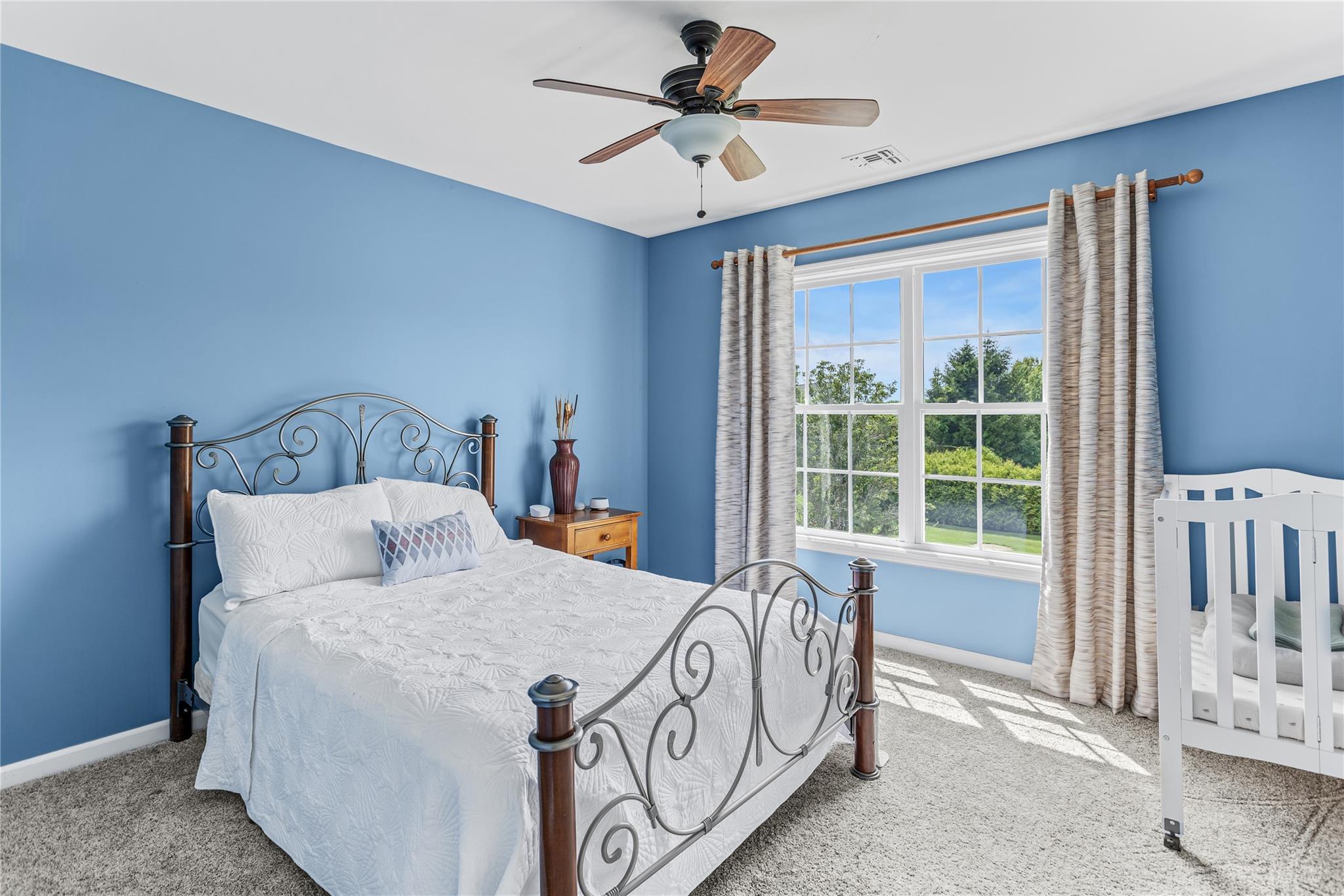 265 Hidden Acres Path Wading River, NY 11792 - Photo 20 of 46 Bedroom with carpet floors and ceiling fan