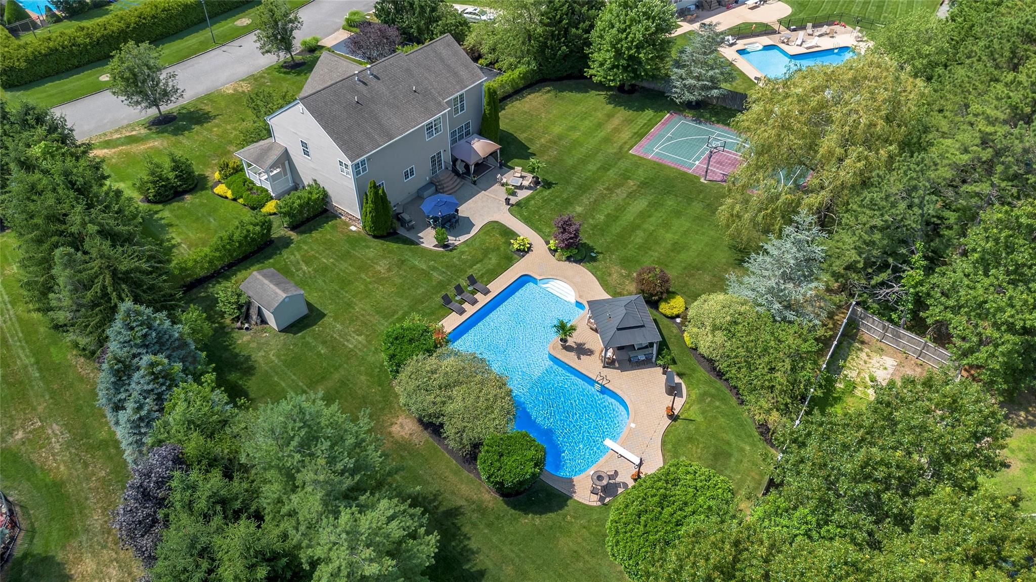 265 Hidden Acres Path Wading River, NY 11792 - Photo 2 of 46 Bird's eye view of a pool