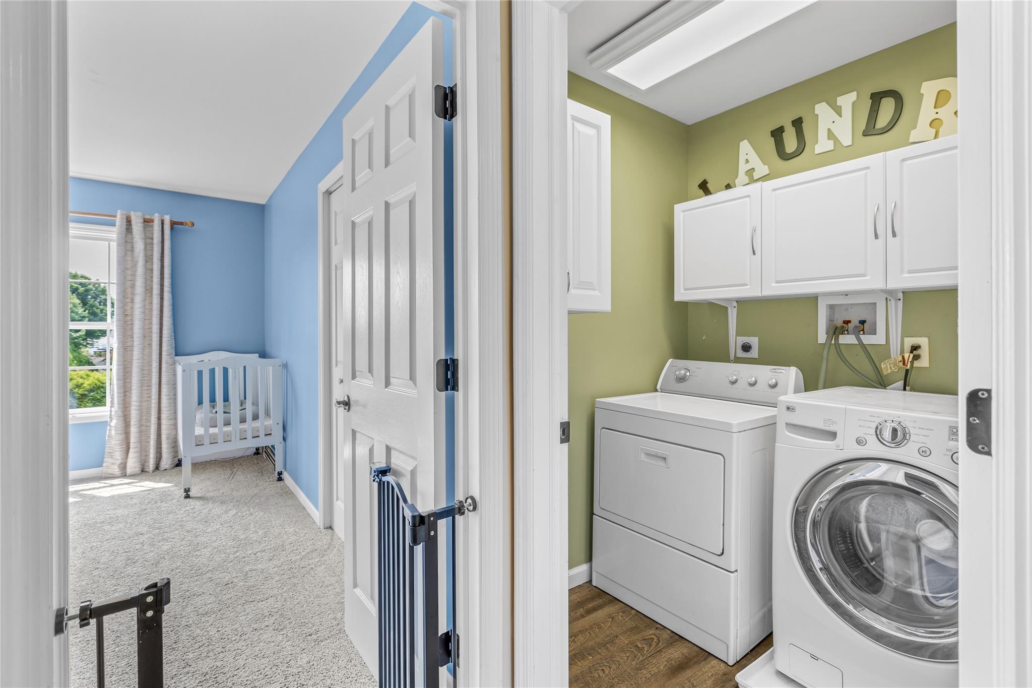 265 Hidden Acres Path Wading River, NY 11792 - Photo 23 of 46 Washroom featuring cabinet space and independent washer and dryer