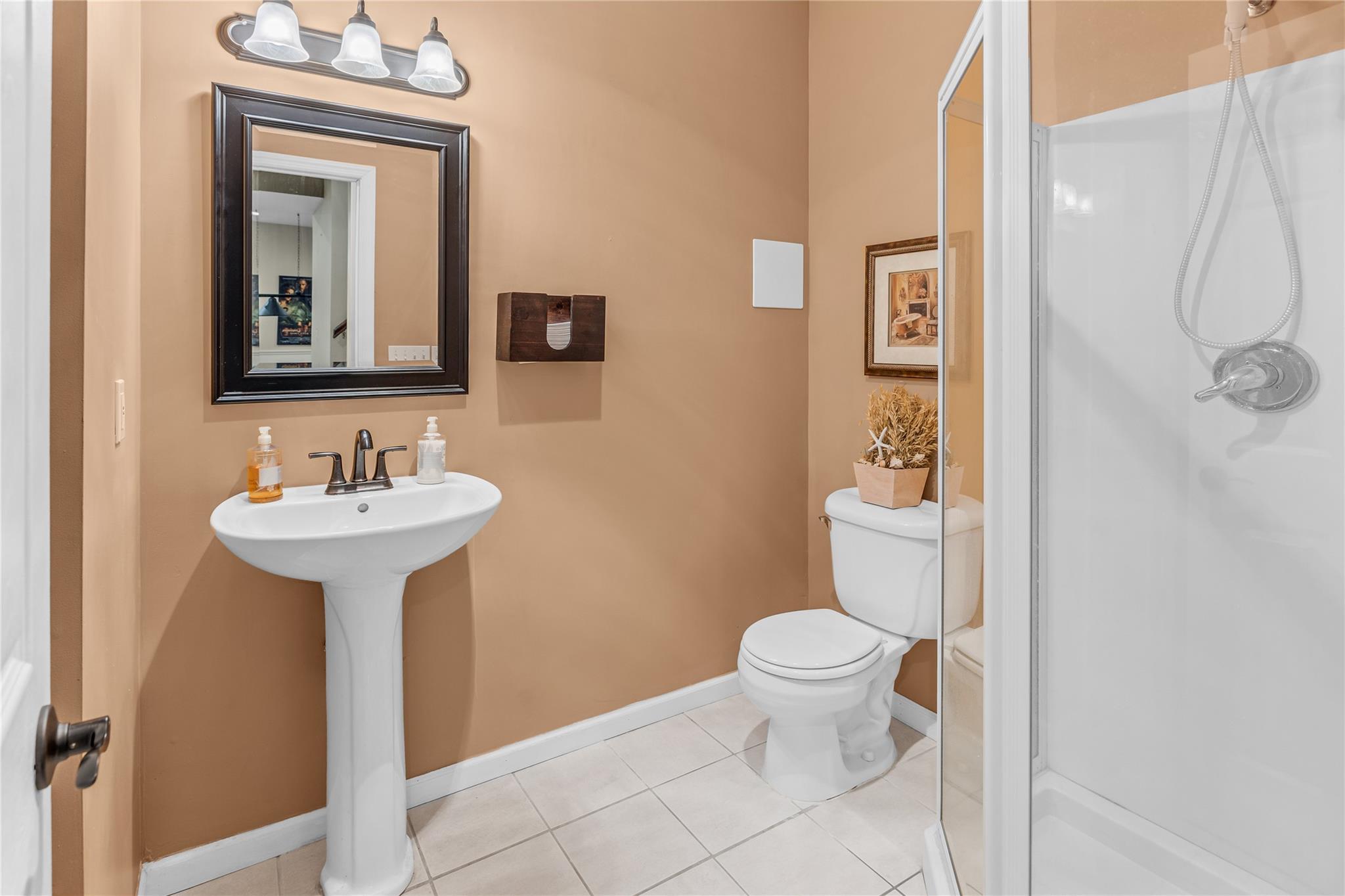 265 Hidden Acres Path Wading River, NY 11792 - Photo 28 of 46 Bathroom featuring a stall shower and tile patterned floors