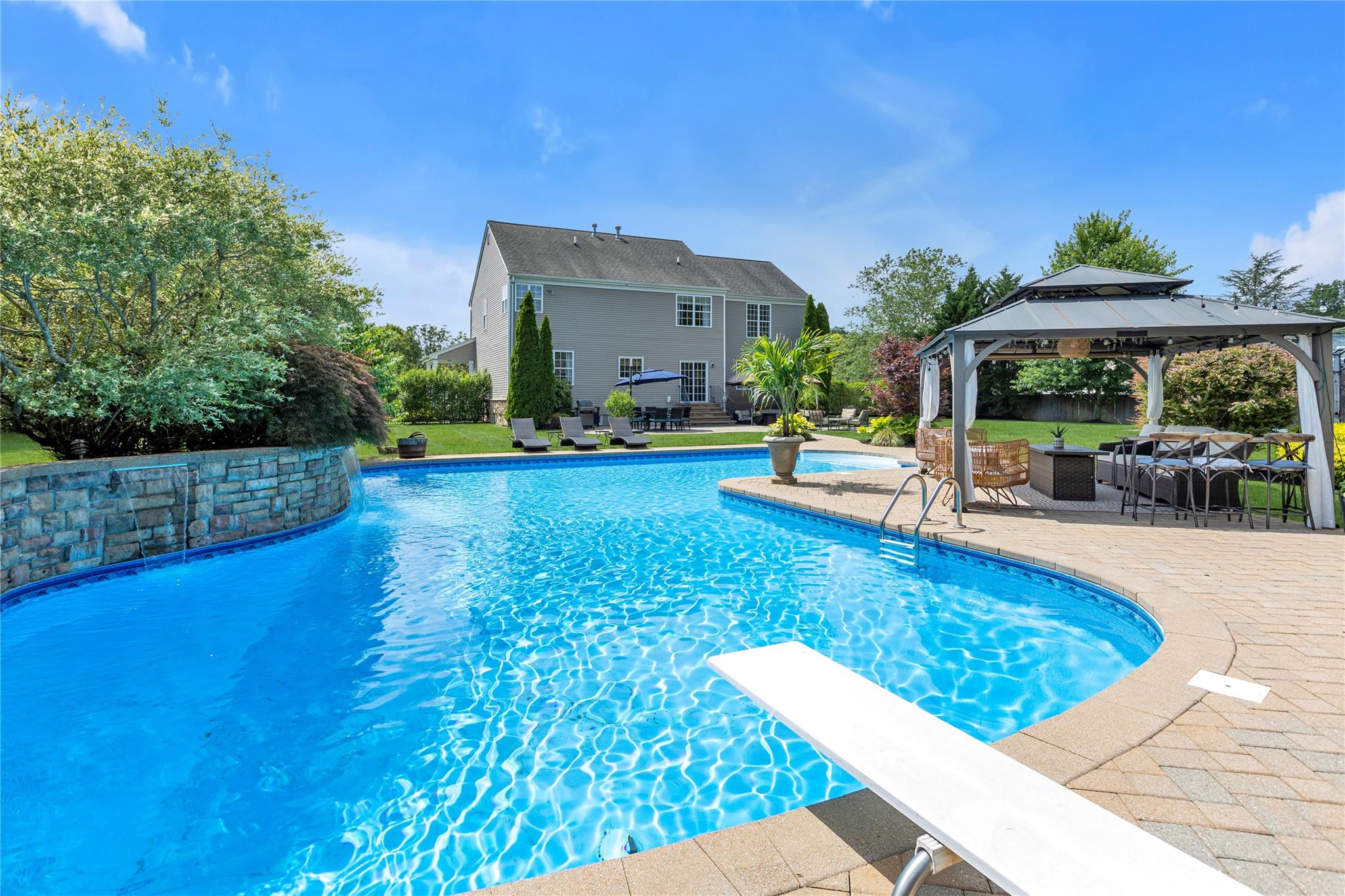 265 Hidden Acres Path Wading River, NY 11792 - Photo 30 of 46 Outdoor pool featuring a patio area, a gazebo, and a diving board