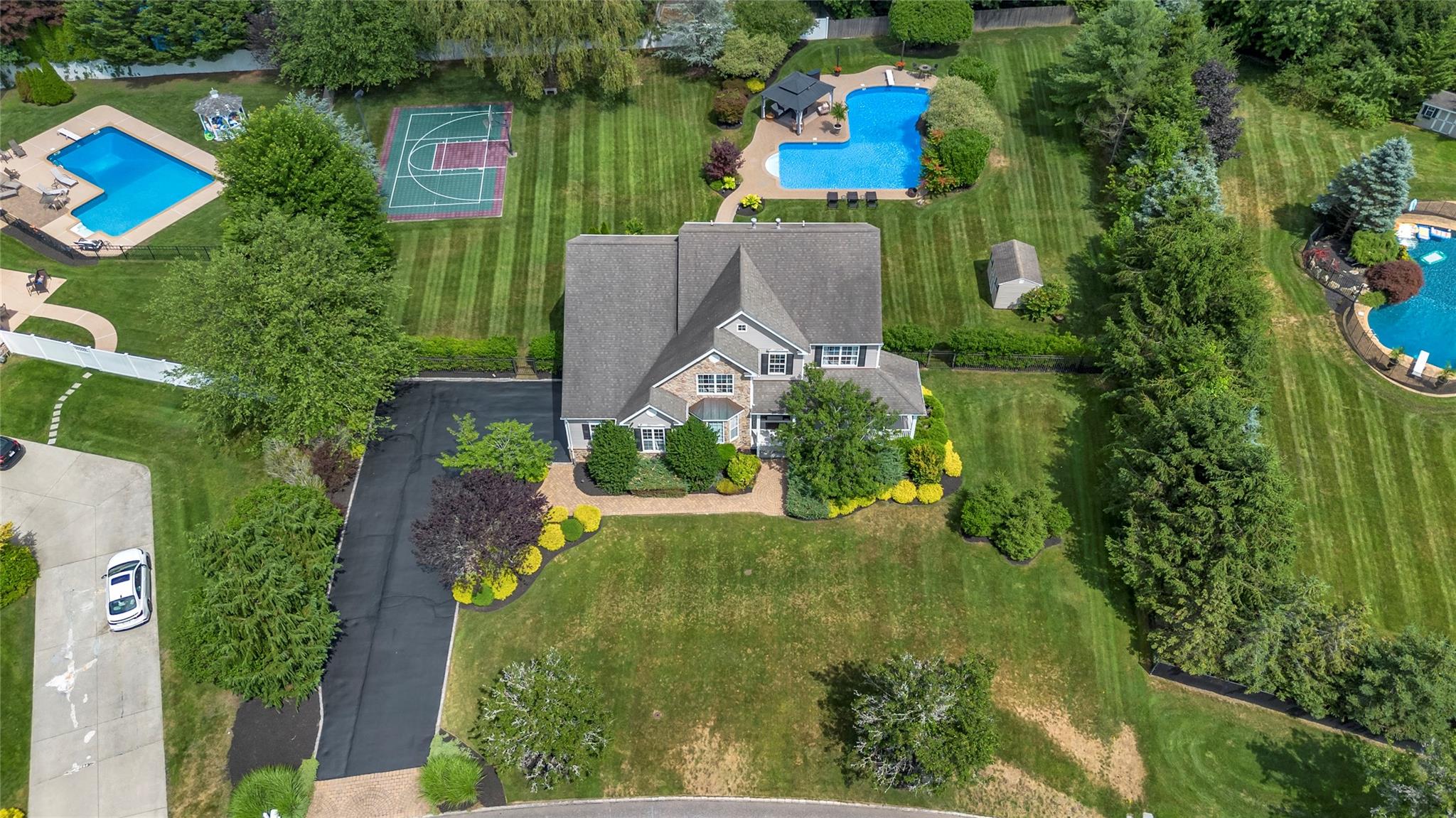 265 Hidden Acres Path Wading River, NY 11792 - Photo 3 of 46 Aerial view of a pool area