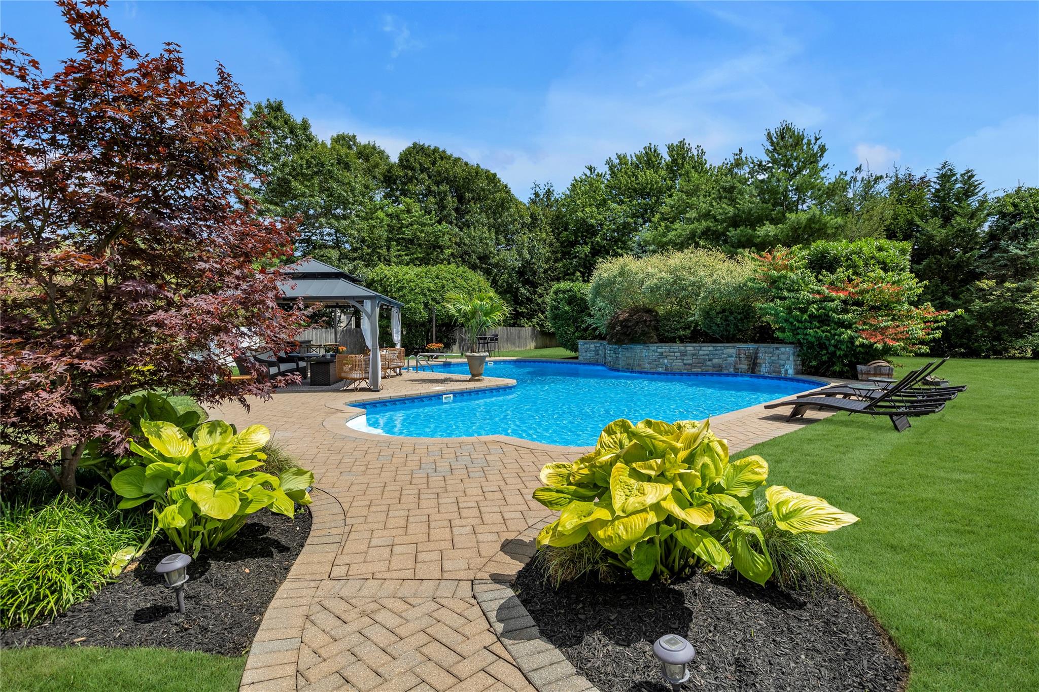 265 Hidden Acres Path Wading River, NY 11792 - Photo 33 of 46 Outdoor pool featuring a gazebo, a patio, and view of wooded area