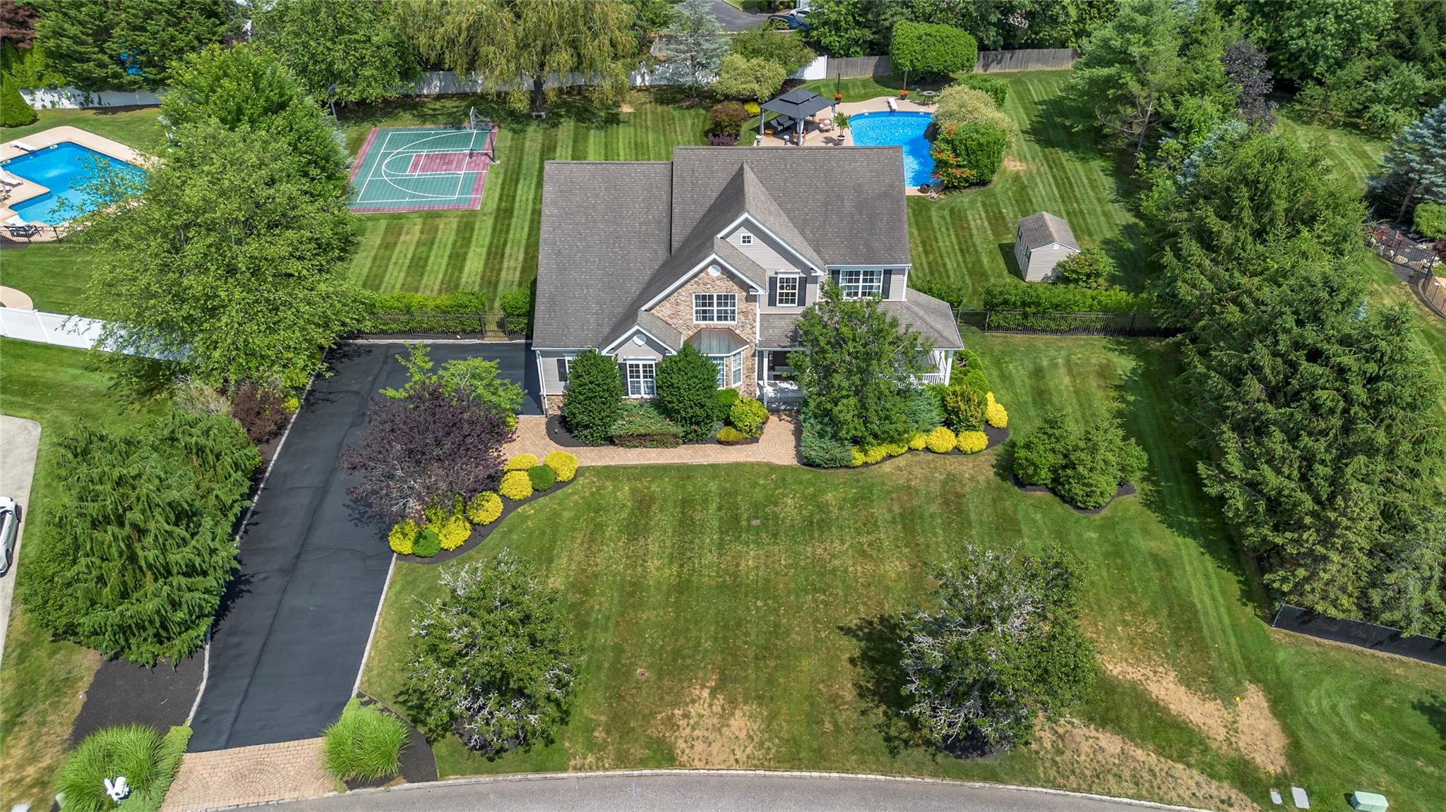 265 Hidden Acres Path Wading River, NY 11792 - Photo 40 of 46 View from above of property with a pool area