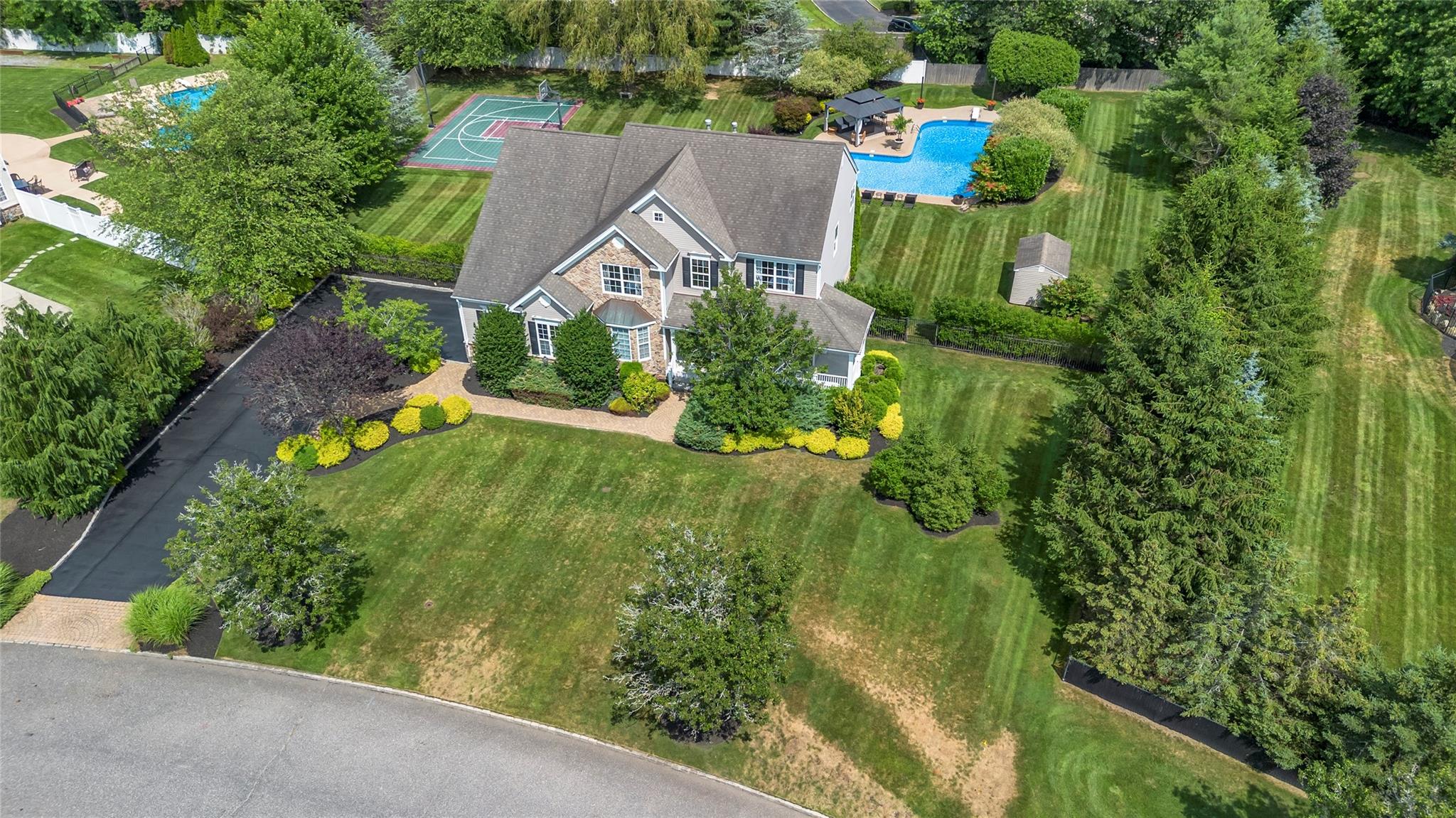 265 Hidden Acres Path Wading River, NY 11792 - Photo 41 of 46 View from above of property with a pool area