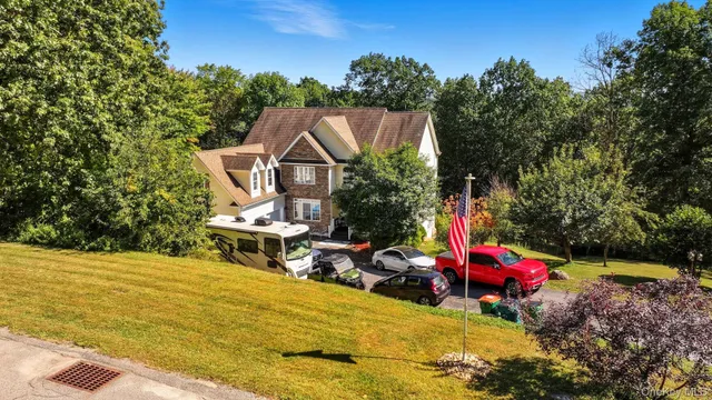 an outdoor space with swimming pool and furniture
