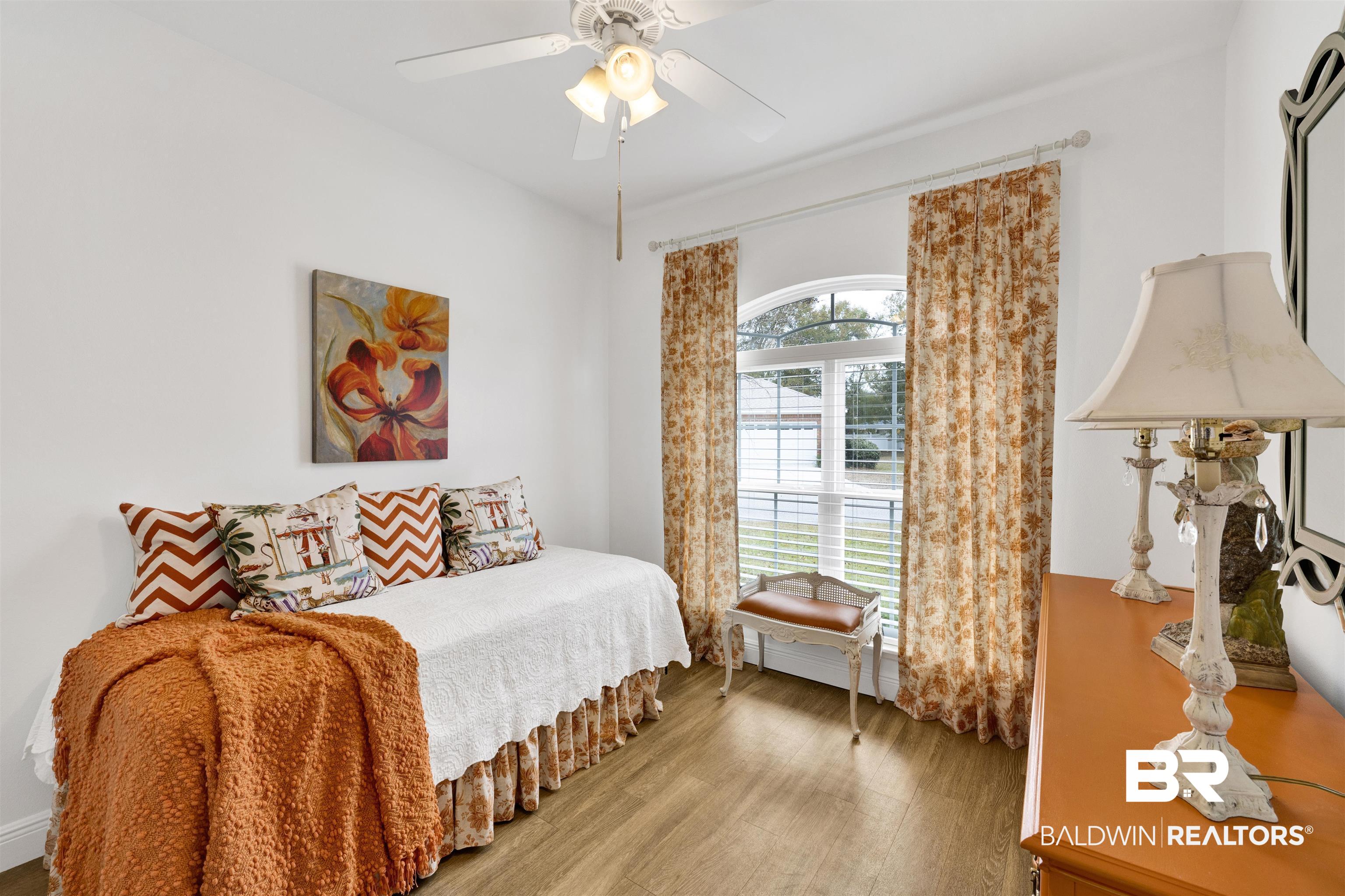 164 Mark Twain Loop Foley, AL 36535 - Photo 23 of 25 Bedroom featuring wood finished floors and ceiling fan
