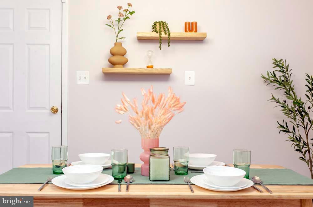 9200 Friar Road Fort Washington, MD 20744 - Photo 22 of 29 a vase of flowers sitting on a table
